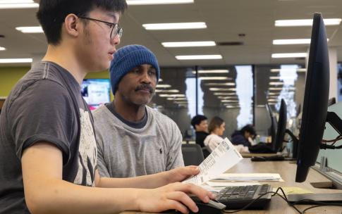 VITA site coordinator Christopher Park helping a client at CSULB
