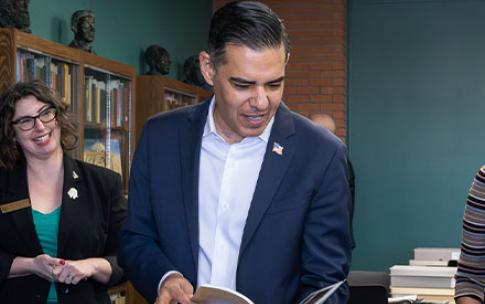 Person looks over materials in archive room
