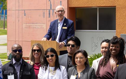 49 Under 49 honorees with Preisdent David Andrews '82