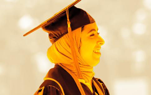 A graduate wearing regalia