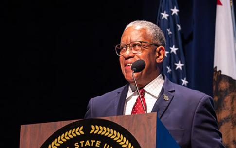 President Loren J. Blanchard speaks on the Carpenter Center stage