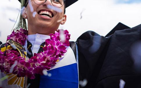 Male graduate celebrating