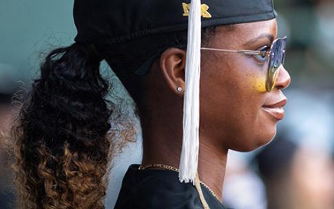 Female graduate looking forward