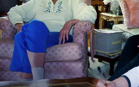 Older adult with student nurses