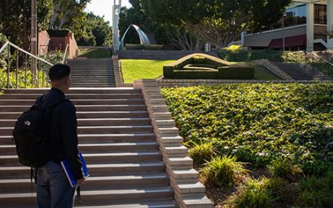 First-gen student Jose Raya Perez looking at USU