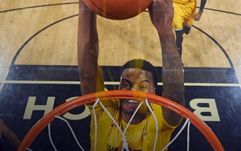 Basketball player dunking