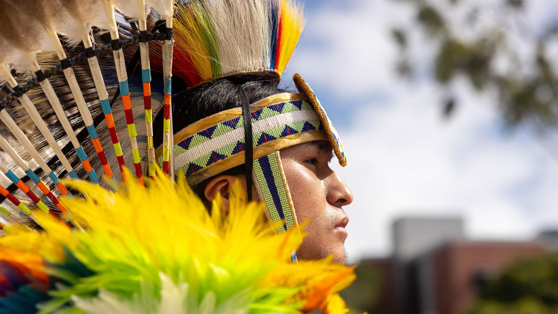 Man dressed in Native American regalia