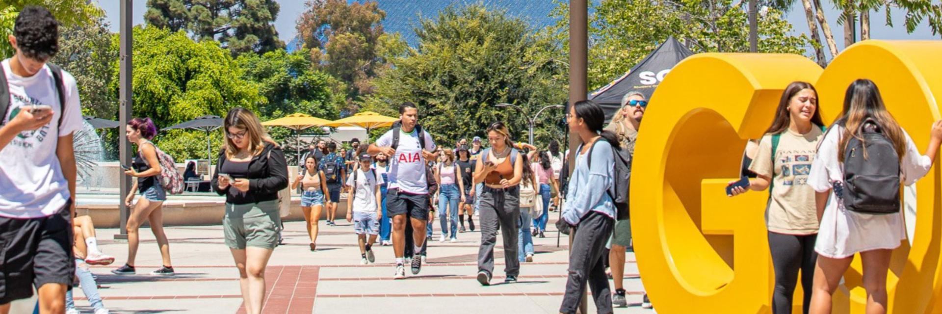 Students walk through the courtyard on the first day of school.