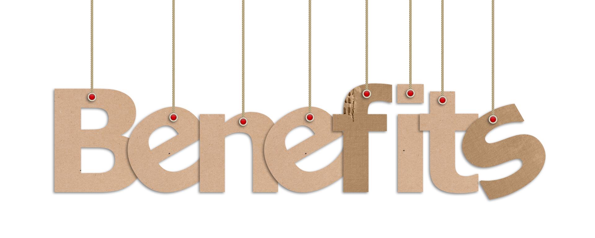 "Benefits" in cardboard letters