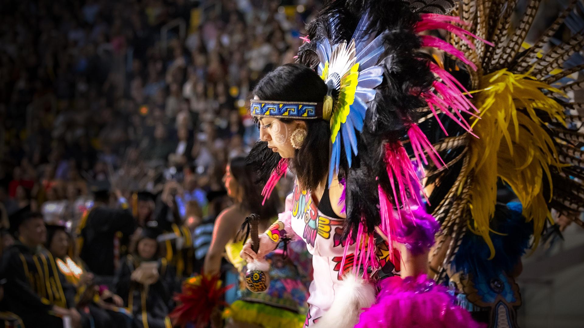 Culturally dressed students dance
