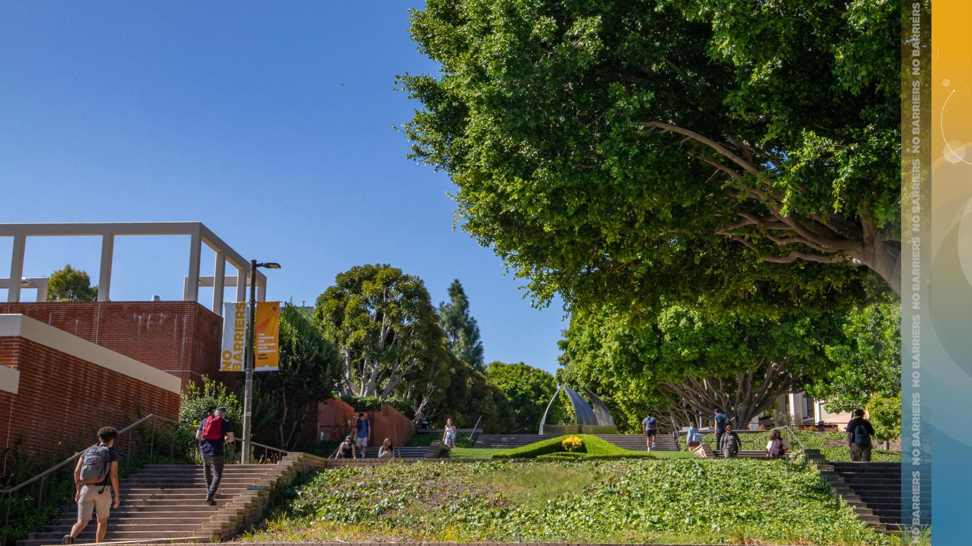 Students walking along campus stairways.