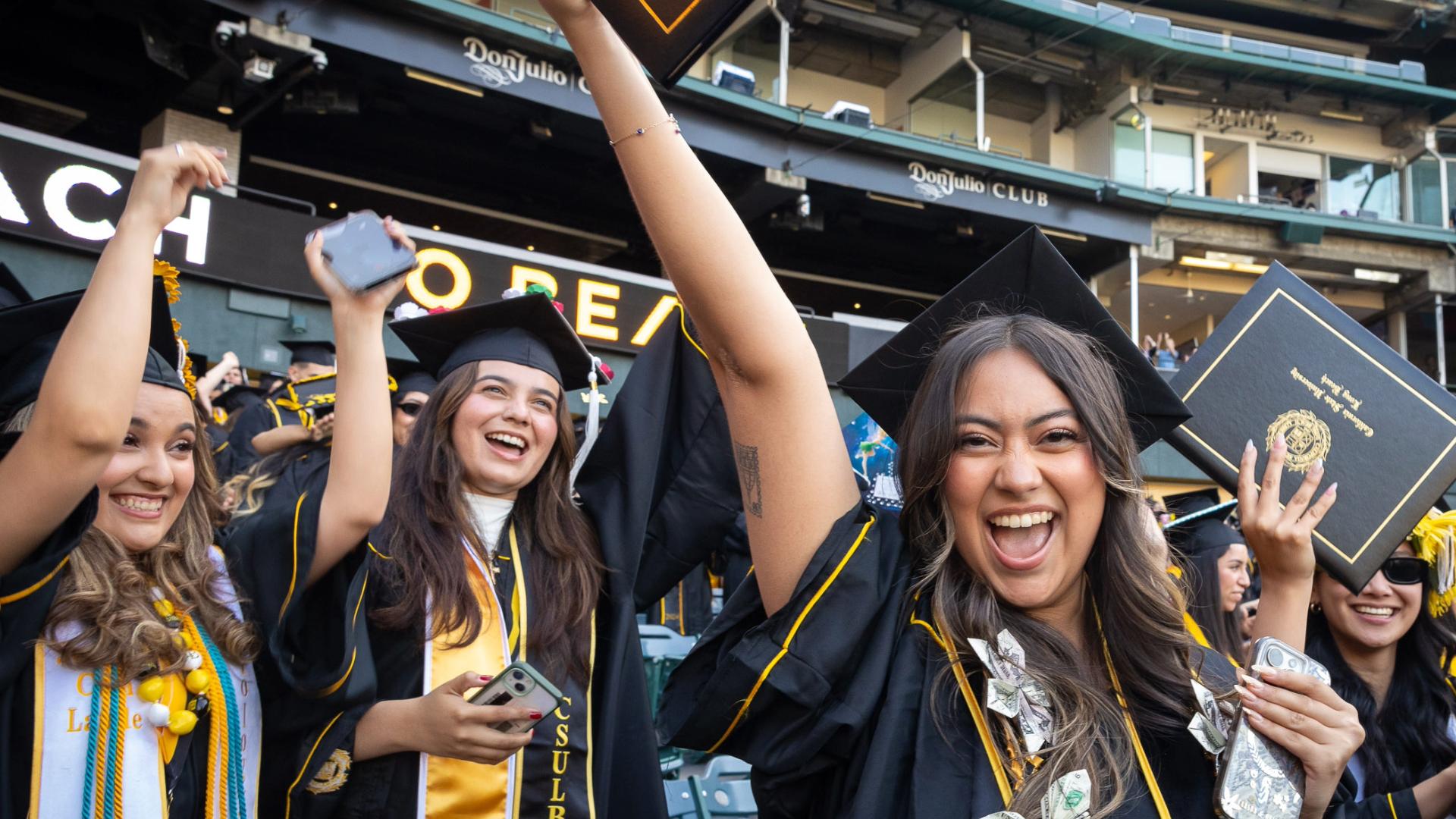 Graduates celebrating at 2024 Commencement