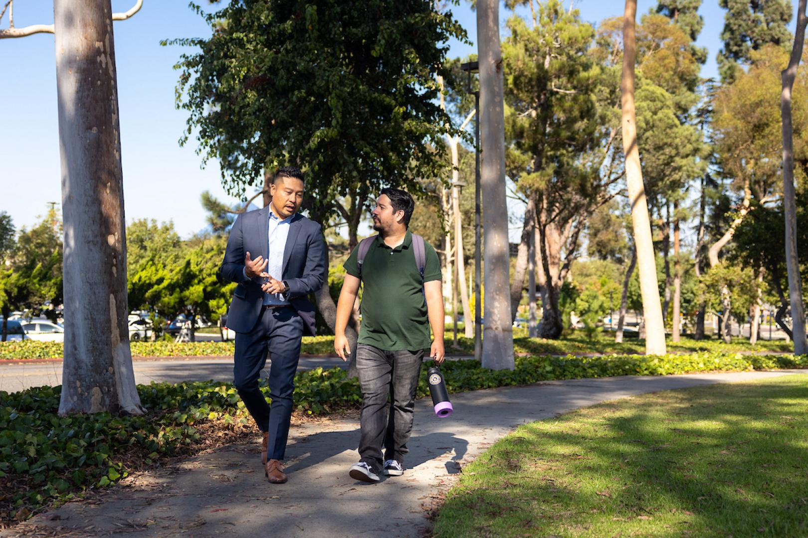 CSULB Alumni with student on campus