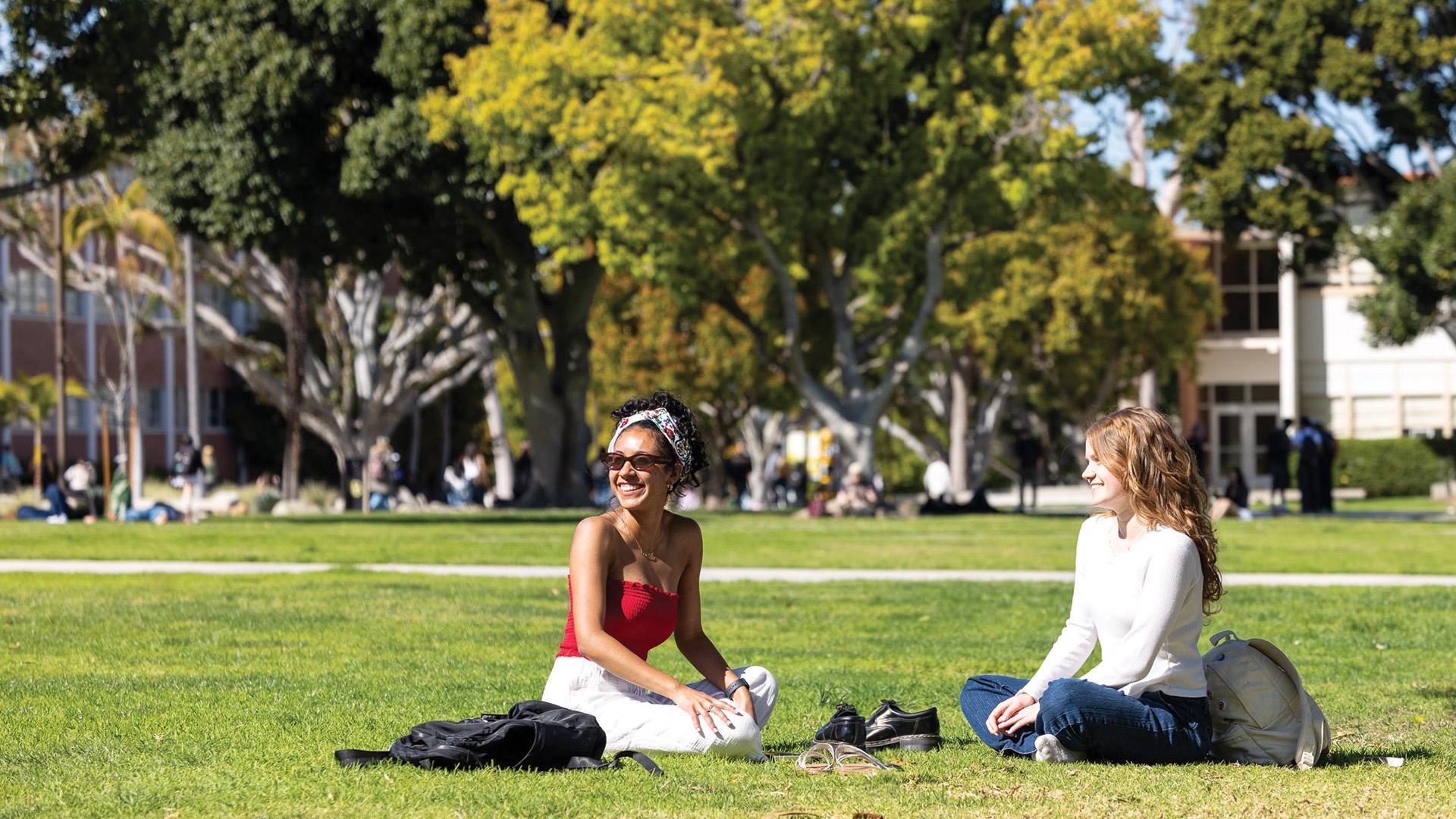 Students chilling on the campus lawan