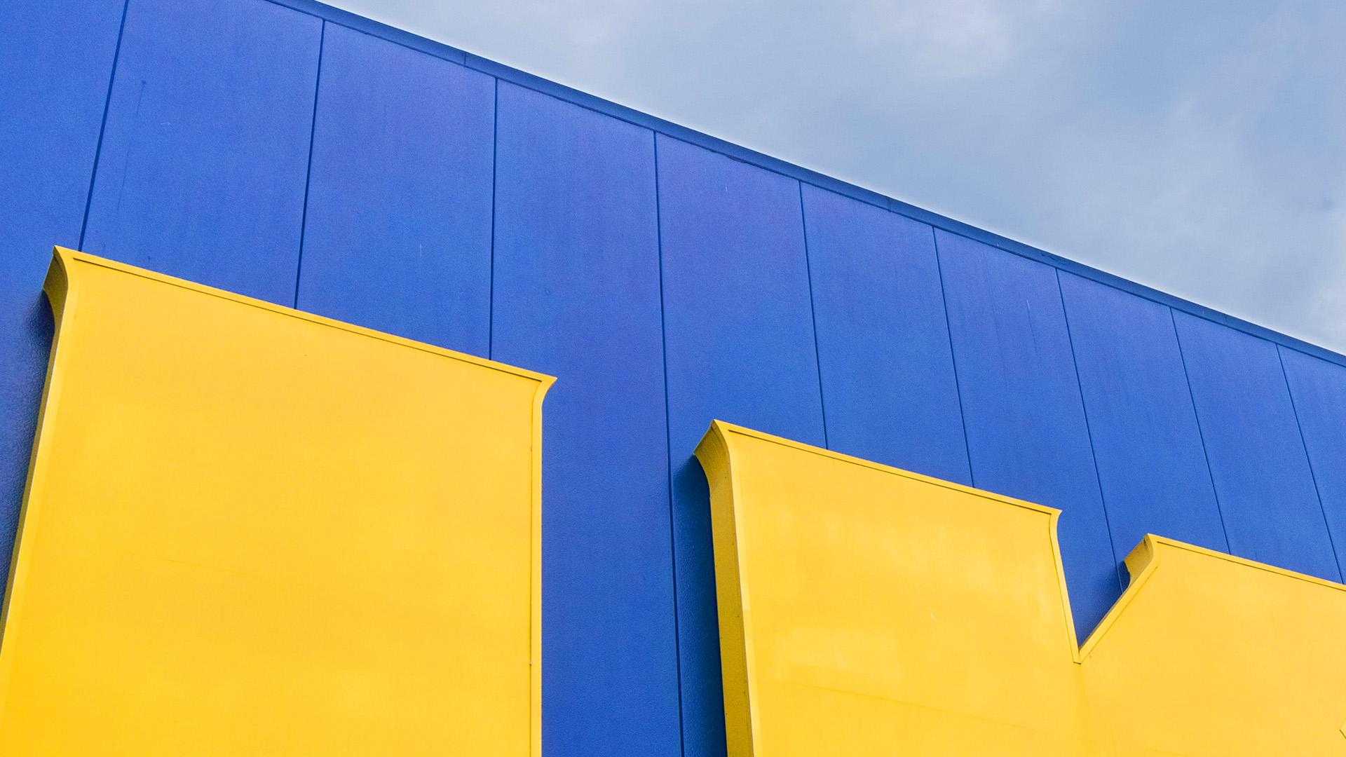 Yellow letters against a blue background and the sky