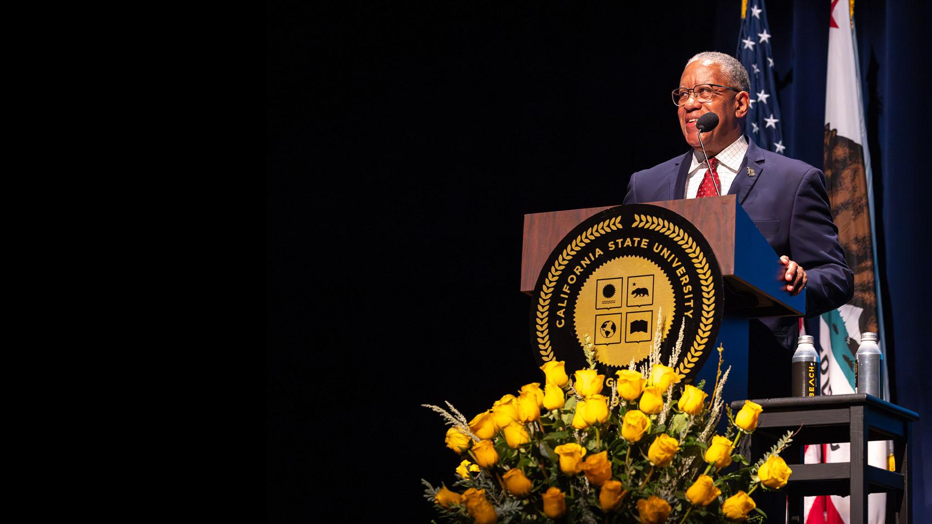 President Loren J. Blanchard behind the podium at Convocation