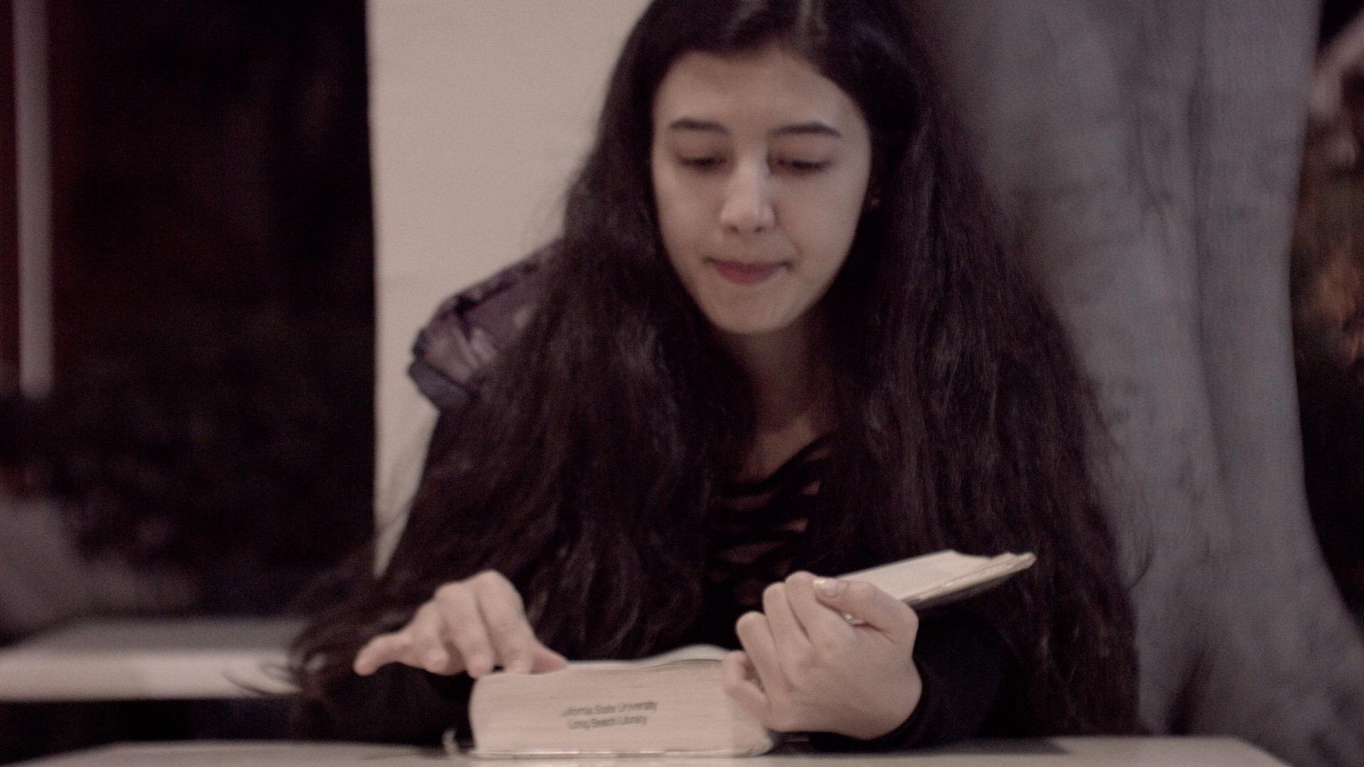 Student reading a book.