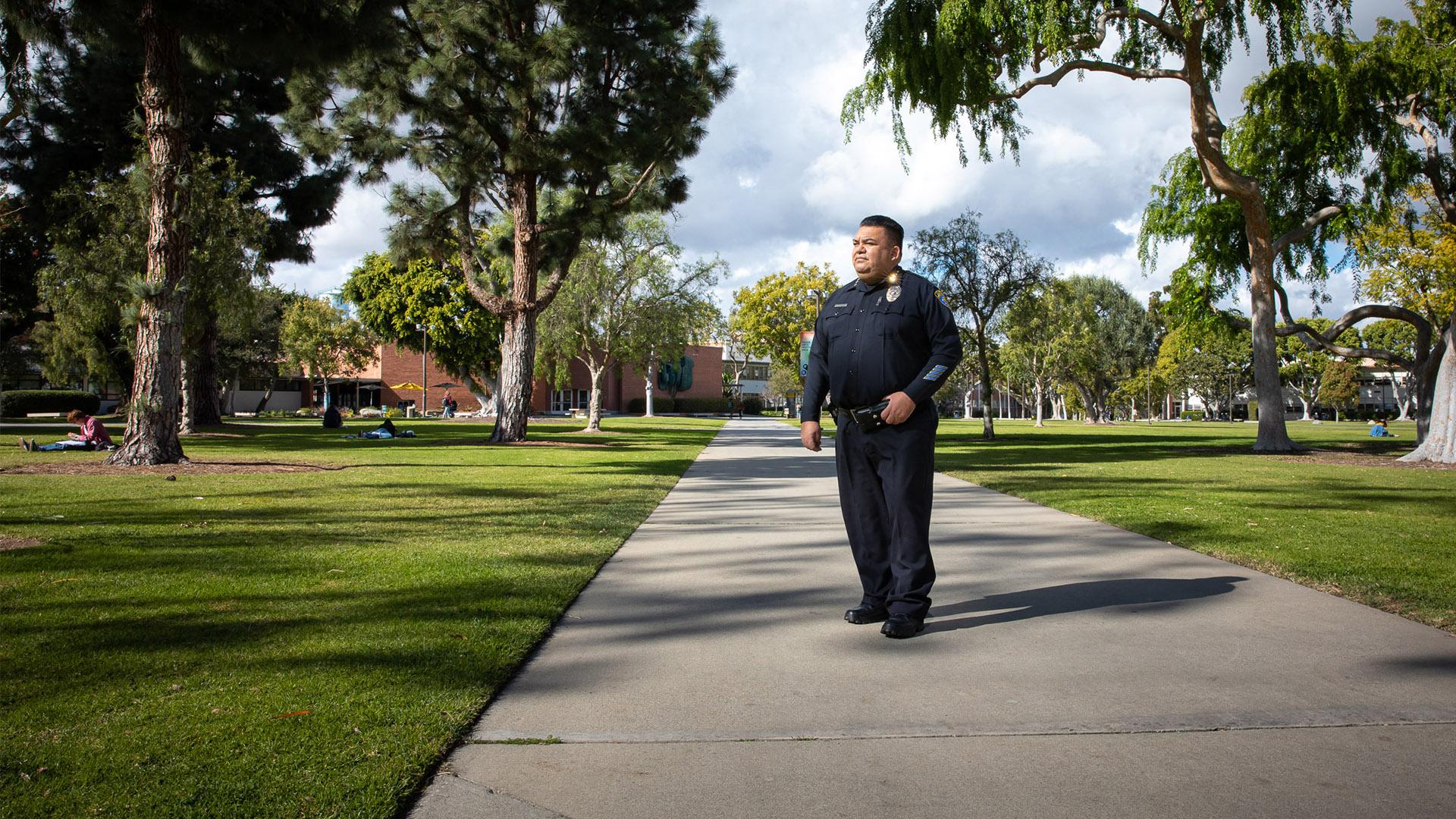 Chief Fernando Solorzano walking on campus