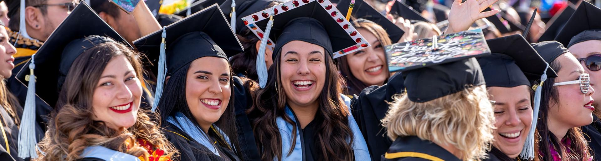 Group of graduates celebrating at commencement