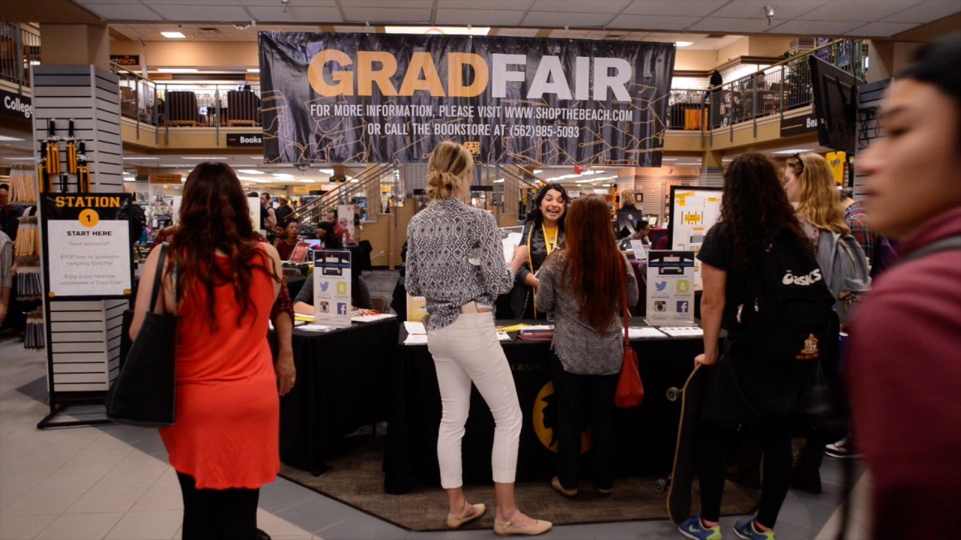 Students attend Grad Fair in the University Bookstore.