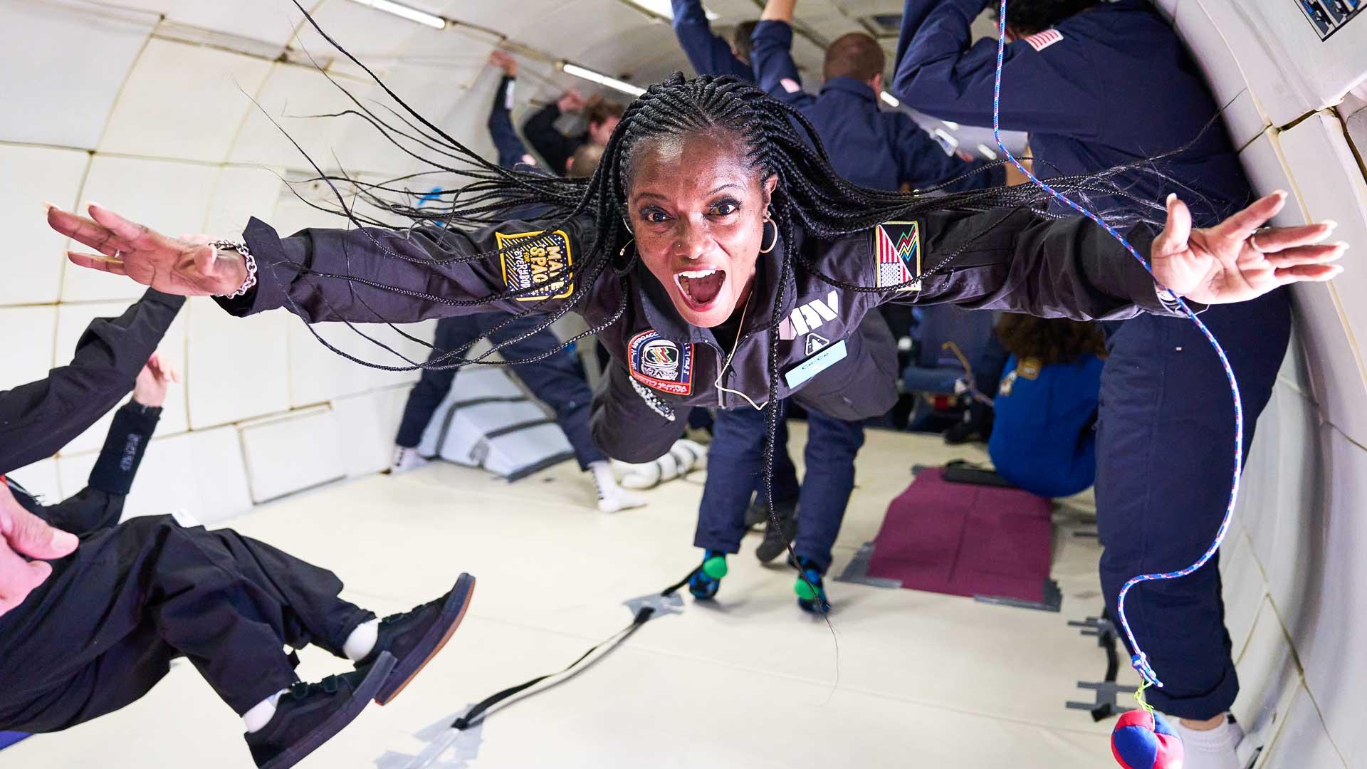 Women expresses joy in space