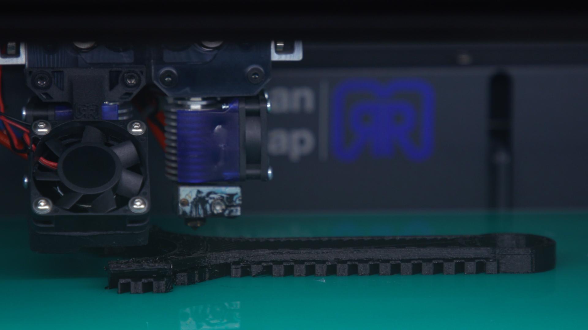 A 3D printer in action.