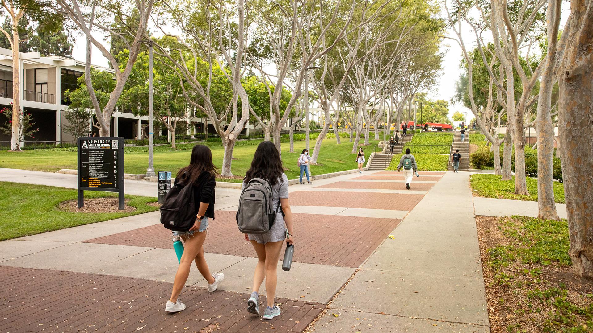 students walking on campus
