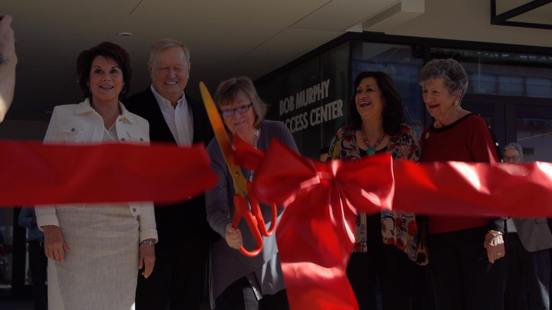 Jane Close Conoley cuts the ceremonial ribbon on the new Student Success Center.