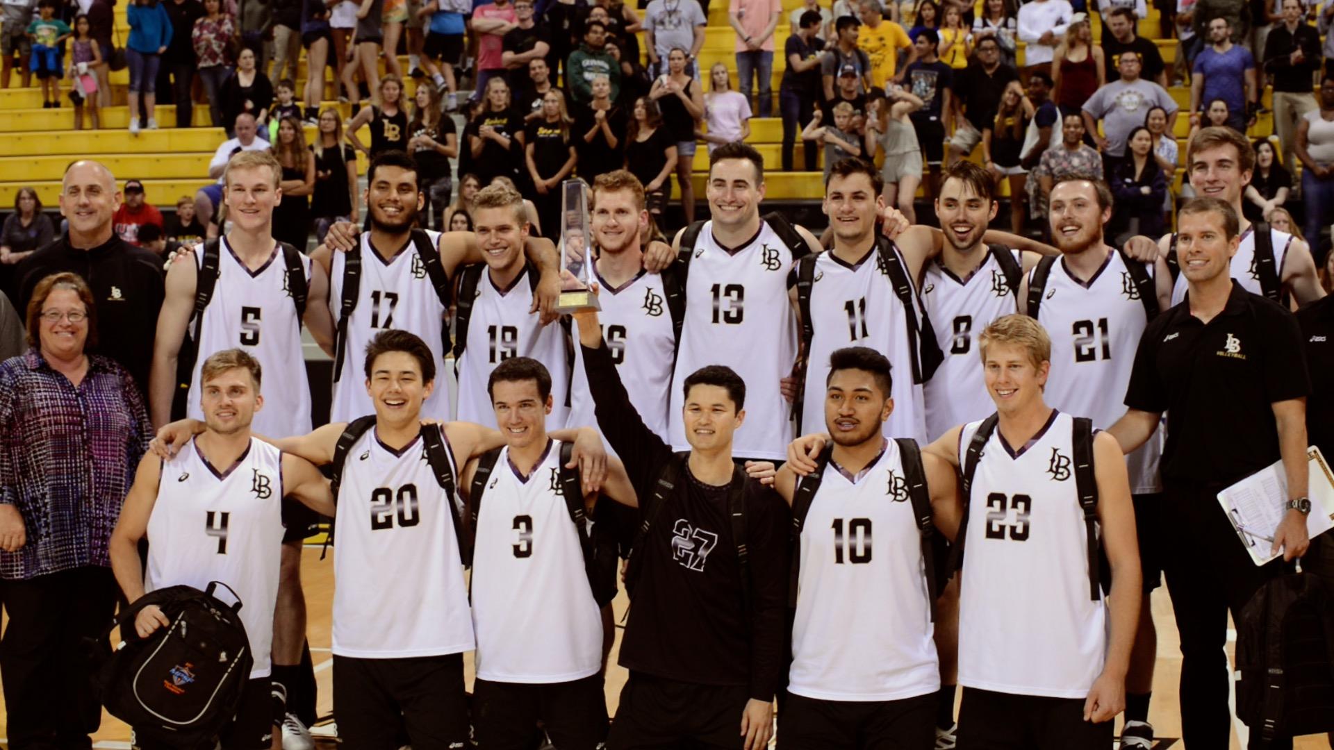 The Men's Volleyball team poses with the MPSF Championship trophy.