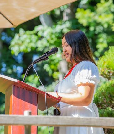 Student speaking at podium