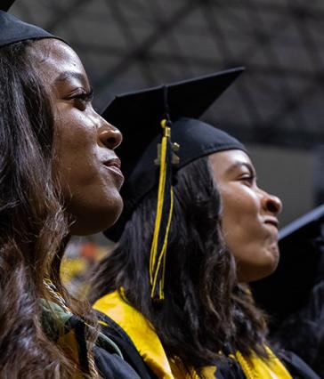 Two Black female students looking forward