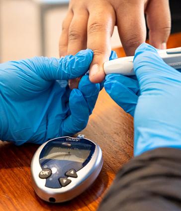 Student nurse draws blood