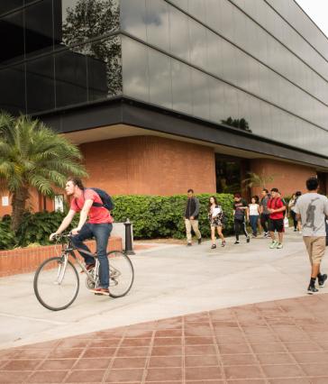 students passing the College of Business
