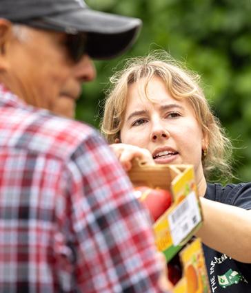 Hailey Wesling grabs produce