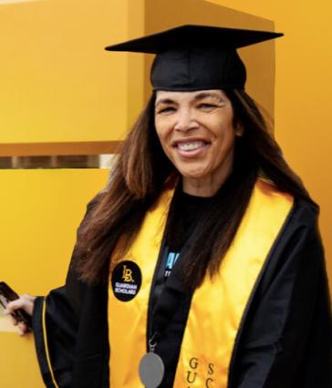 Ebony Tay in graduation regalia