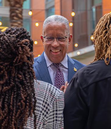 CSULB President Loren J. Blanchard meeting people on campus