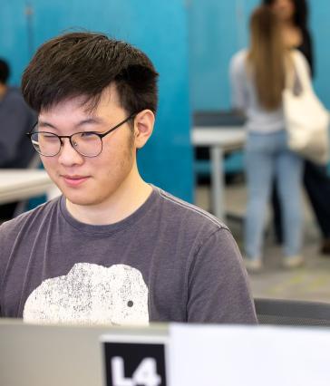 CSULB student Christopher Park with a VITA client
