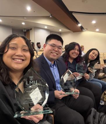 COB IS Abygail Caparoso, Timothy Tan, and Ha (Heather) Pham—took home first place at the 2026 LMU Datathon