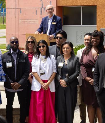 49 Under 49 honorees with Preisdent David Andrews '82