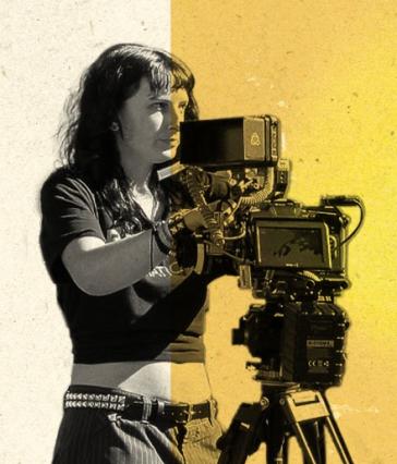 Person operates a video camera on a tripod