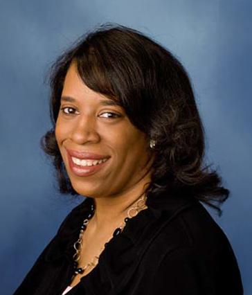 Headshot of a person smiling