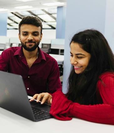 Sunstone Innovation Challenge participants using laptop
