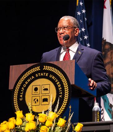 President Loren J. Blanchard speaks on the Carpenter Center stage