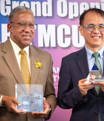 CSULB President Loren J. Blanchard, left, and MCU President Hsuan-Shih Lee