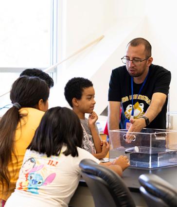 student teacher with young learners