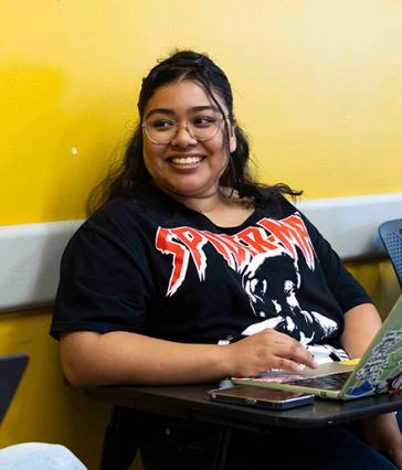 A CSULB students taking Archival Quest: Reclaiming Latinx Rhetorics