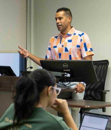 CSULB assistant professor Matt Lesenyie teaching 