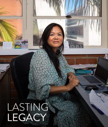 Professor Sophia Seng sitting at her desk