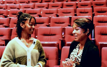 An interviewer speaks with alumna Cecile Harris Walters