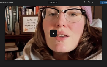 woman's face in front of bookcase